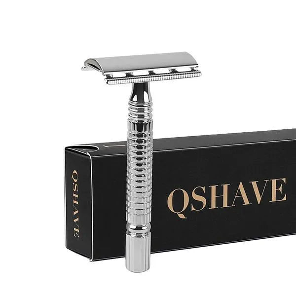 Double edged safety razor with stainless steel handle and closed comb head in storage box