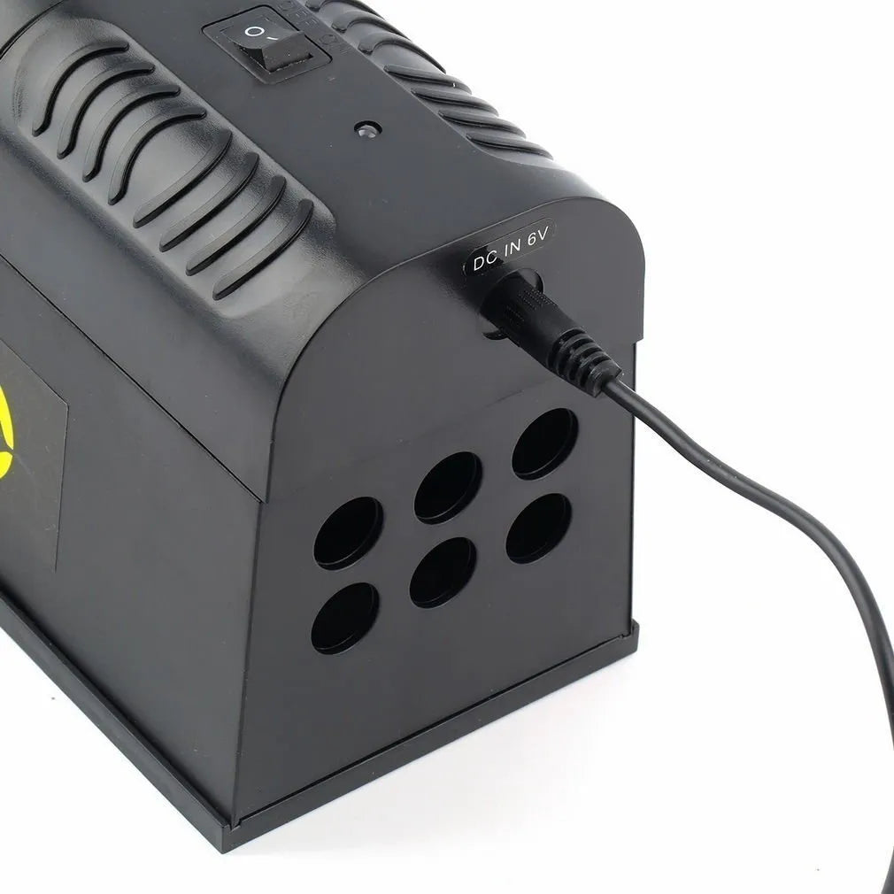 Black high voltage electronic rodent killer unit with choice of UK, EU, or US plug types.