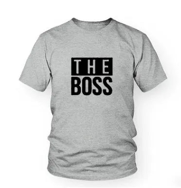 A plain, light grey men's loose-fit T-shirt with a round neck and short sleeves on a hanger.