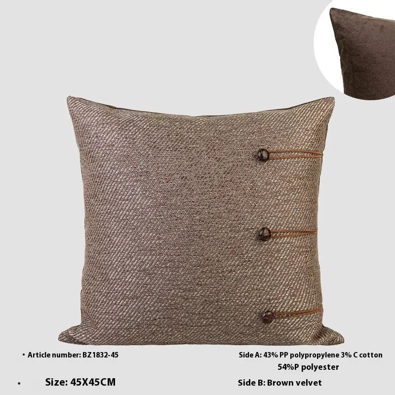Chinese ancient style square pillow cushion in Maillard colours on a sofa.