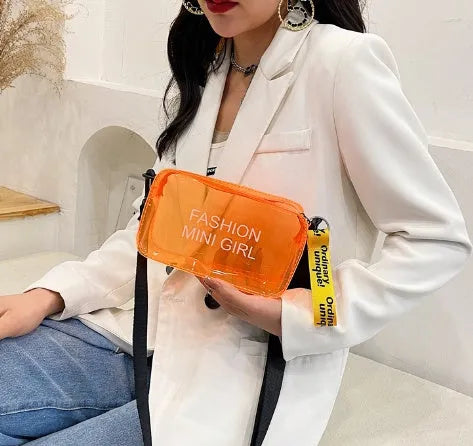 Transparent square jelly shoulder bag with adjustable strap showing mobile phone compartment