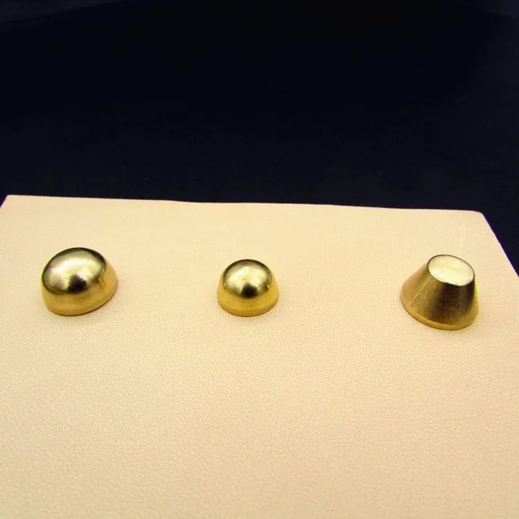 Brass decorative buckle foot nails in round and bucket head shapes, sizes 10x6mm and 12x7mm.