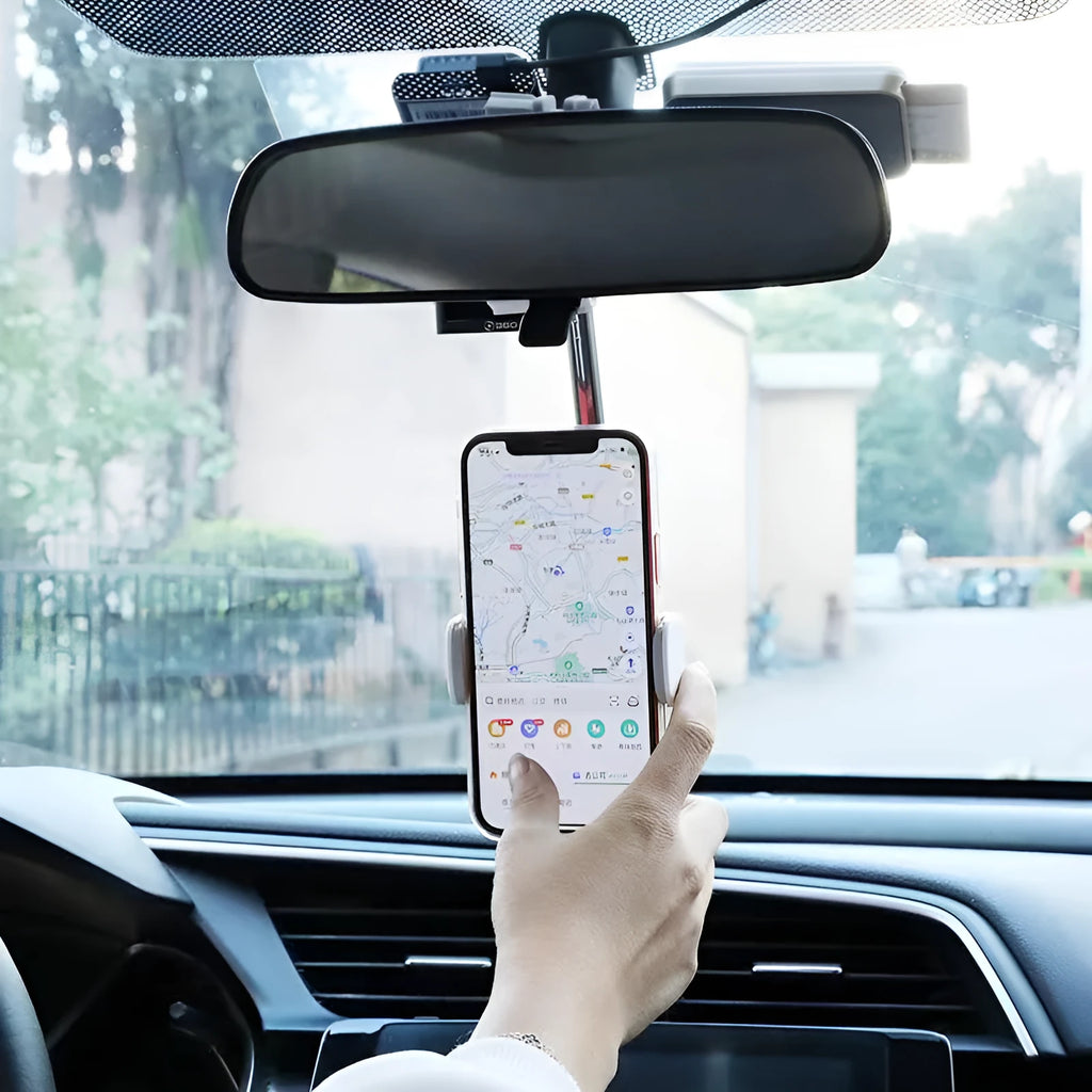 Black ABS plastic smartphone bracket mounted on car rearview mirror holding mobile phone
