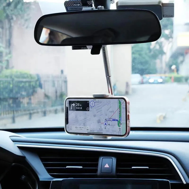 Black ABS plastic smartphone bracket mounted on car rearview mirror holding mobile phone