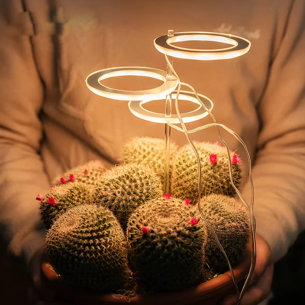 USB powered LED plant grow light with full spectrum LEDs and acrylic mounting stick.