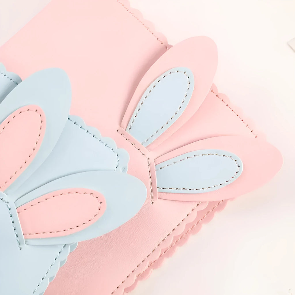 Cute bunny style mini photo album in pink, blue, or white, showing 3-inch size and loose-leaf pages.
