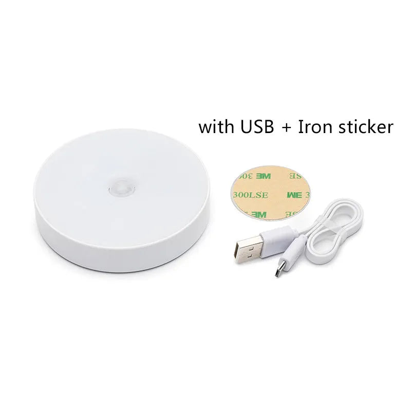 White circular motion sensor night light with USB charging port showing 86mm diameter dimensions