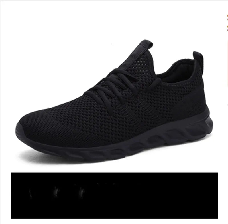 Men's black and white mesh sneaker with lace-up closure and round toe for casual outdoor wear