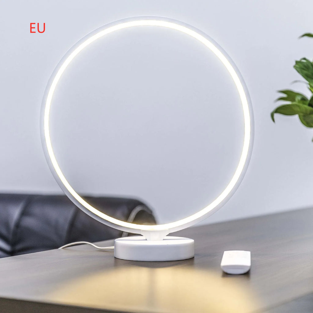 White Full Moon Lamp table lamp with remote control on wooden surface