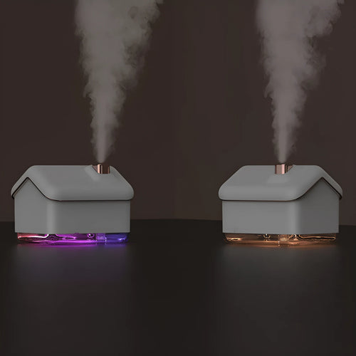 White igloo-shaped ultrasonic humidifier and essential oil diffuser with LED light and USB cable