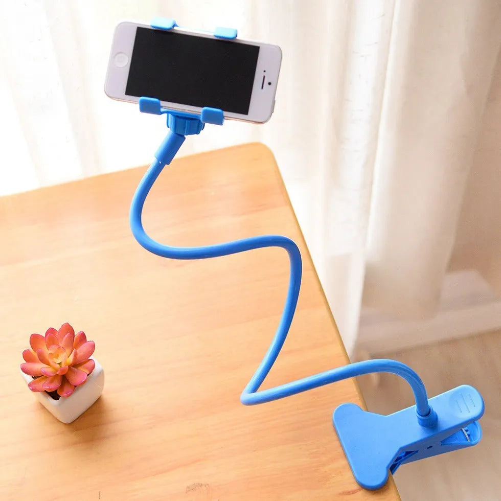 Black flexible long arm phone stand with V-clip holder extended on a desk