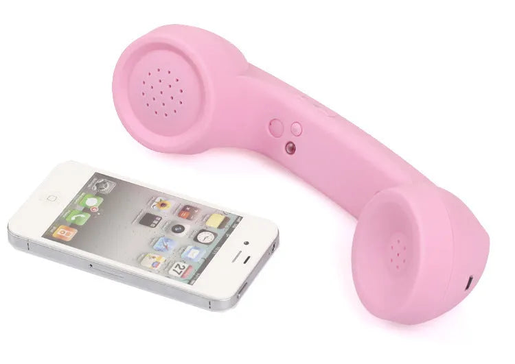 Retro-style Bluetooth wireless headset microphone in hanging-ear design, shown in multiple colour options.