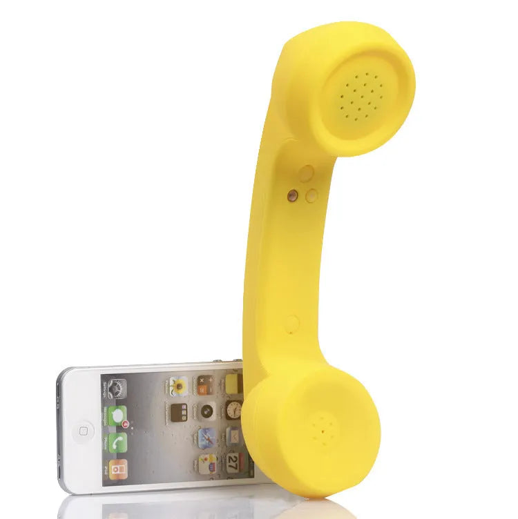 Retro-style Bluetooth wireless headset microphone in hanging-ear design, shown in multiple colour options.