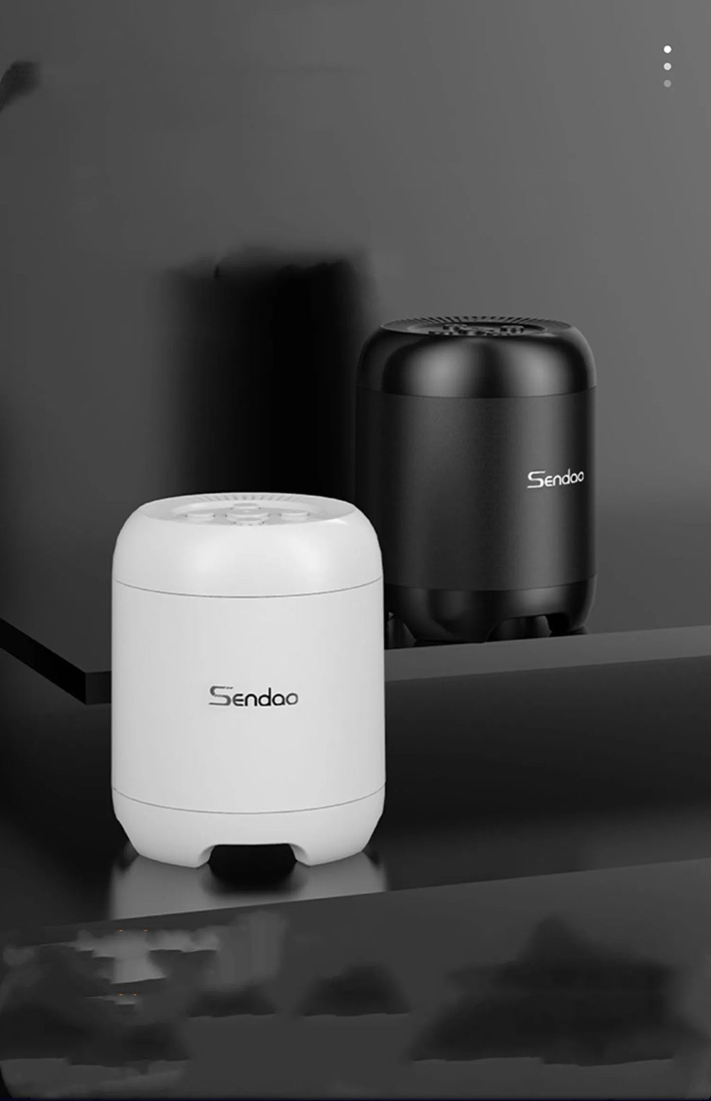 Small black or white wireless Bluetooth speaker with card reader slot measuring 90x73x73mm