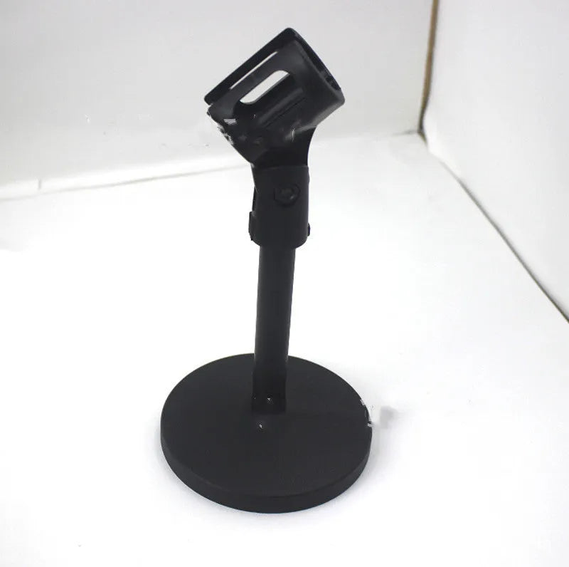 Black metal desktop microphone bracket with triangular base and plastic clip