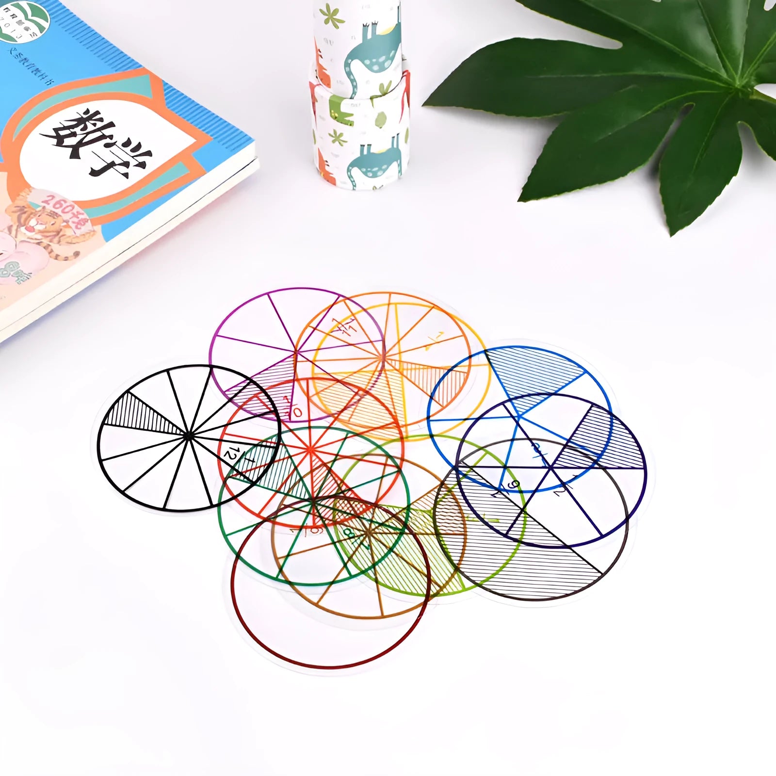 Plastic fraction teaching aids set with magnetic blocks, discs, transparent films, and rulers on a base.