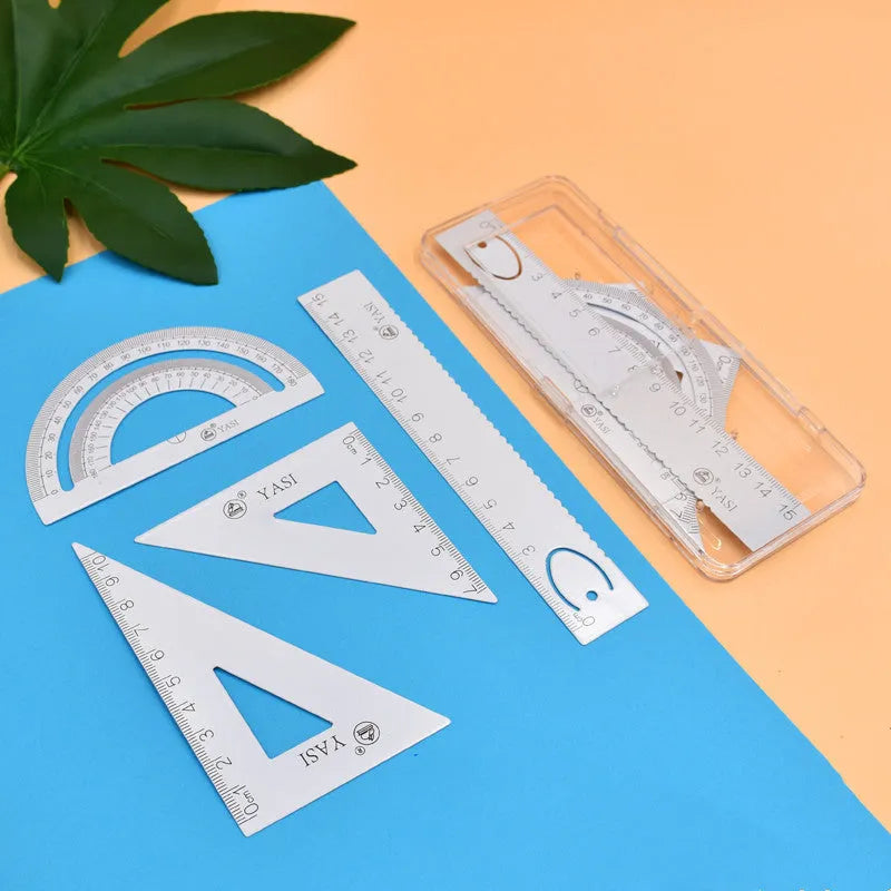 Plastic fraction teaching aids set with magnetic blocks, discs, transparent films, and rulers on a base.
