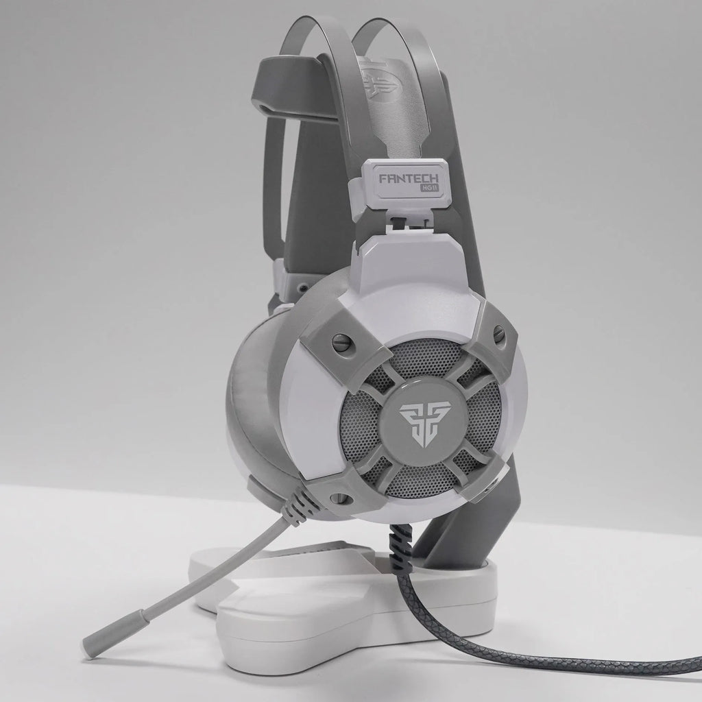 Black FANTECH HG11 USB gaming headset with RGB lights on ear cups.