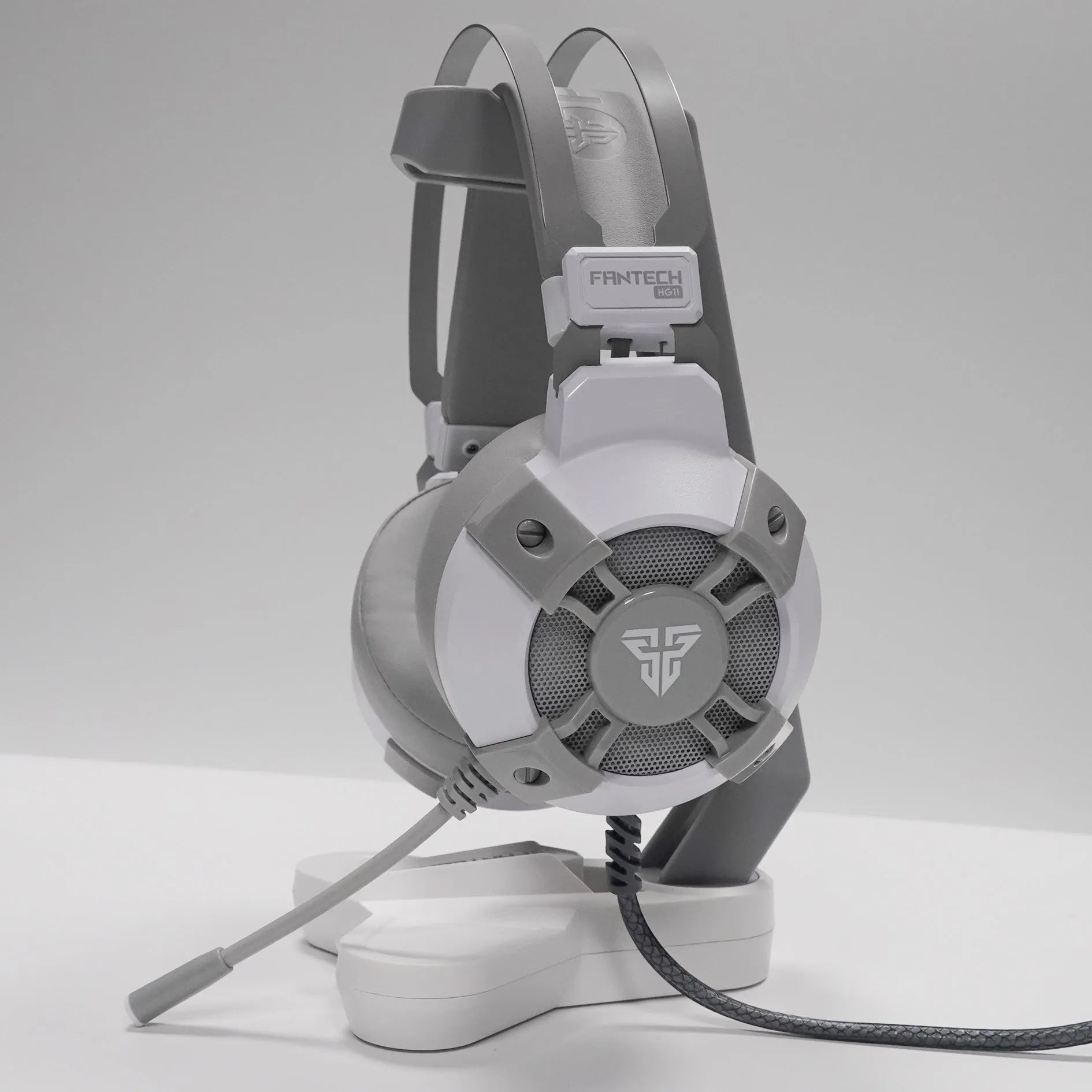 Black FANTECH HG11 USB gaming headset with RGB lights on ear cups.