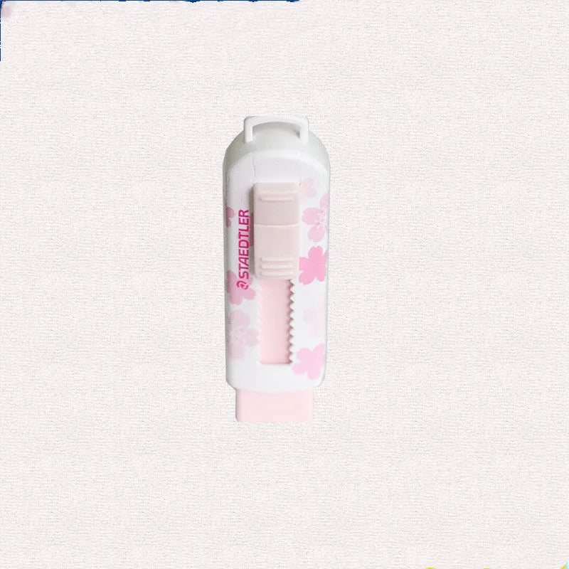 Square pink rubber push-pull tool with replaceable core measuring 86x26x22mm for student use
