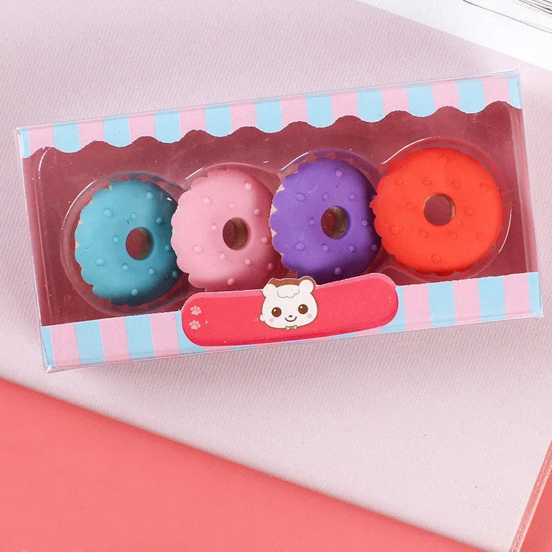 Cartoon eraser gift set with 12 pieces showing cone, ice cream, lollipop, and donut shapes