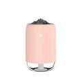 White Magic Flame columnar humidifier with USB cable on a desk