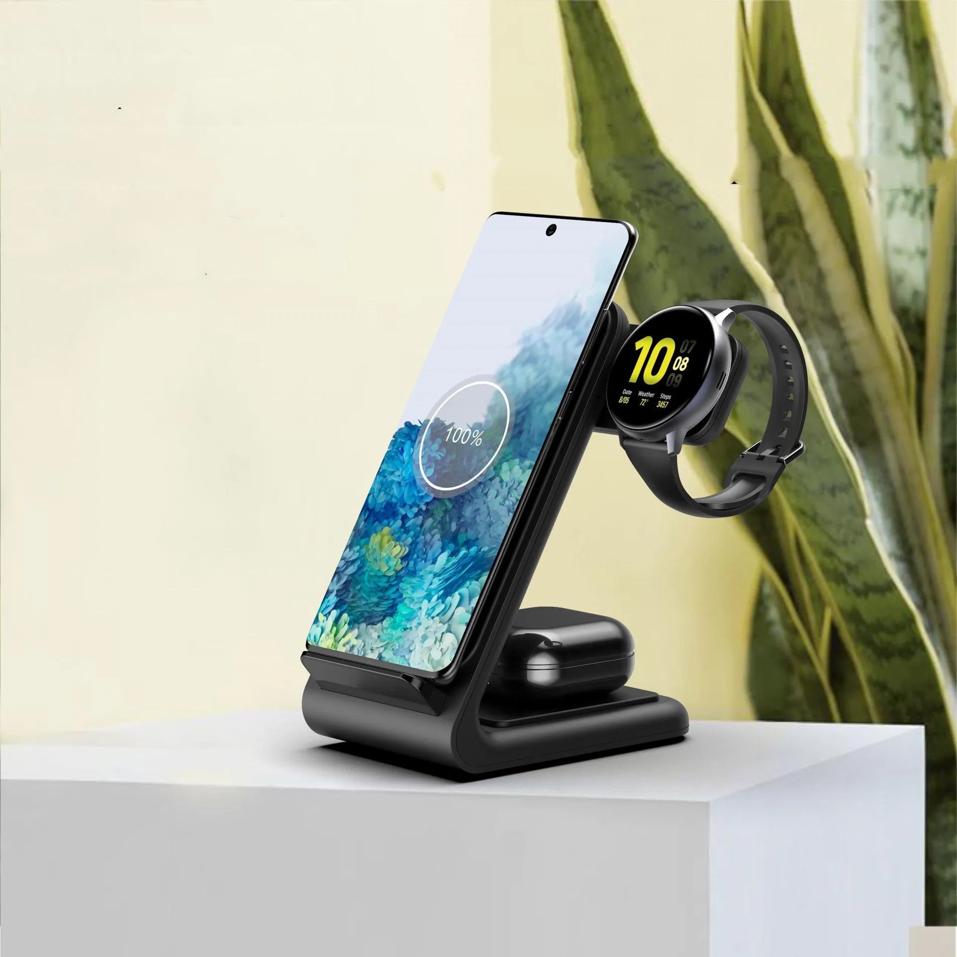 Fast wireless charging three-in-one bracket for iPhone and Samsung devices on desk