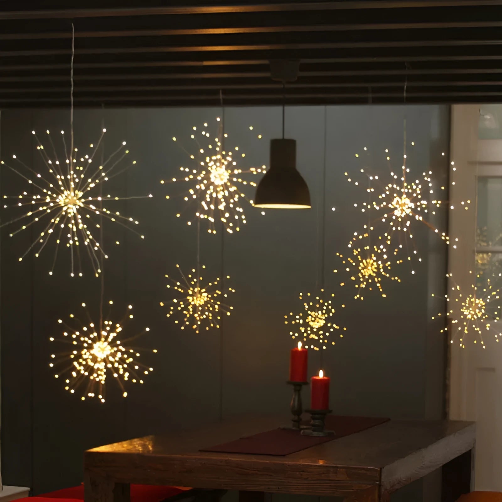 Solar LED meteor shower light with multiple warm white LED strings for indoor or outdoor decorative lighting