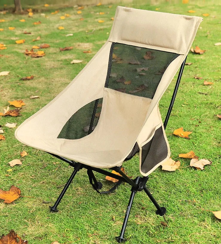 Beige outdoor folding chair with aluminium alloy frame and Oxford cloth seat, folded for portability.