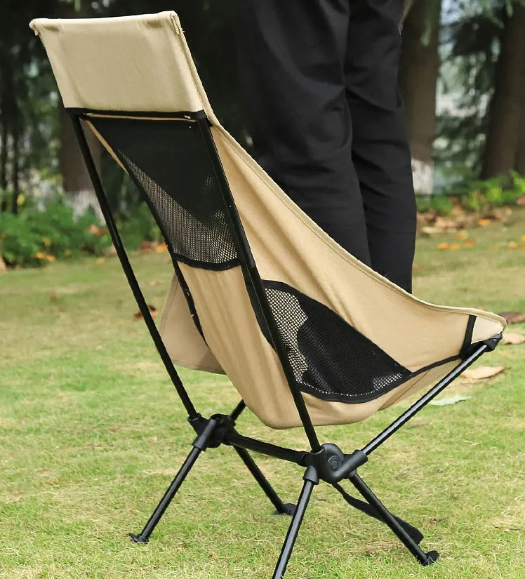 Beige outdoor folding chair with aluminium alloy frame and Oxford cloth seat, folded for portability.