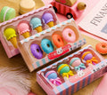 Cartoon eraser gift set with 12 pieces showing cone, ice cream, lollipop, and donut shapes