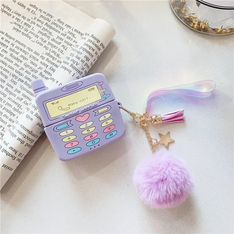 Purple silicone AirPods case with fur ball pendant, clamshell design for AirPods Pro and AirPods 1/2 models