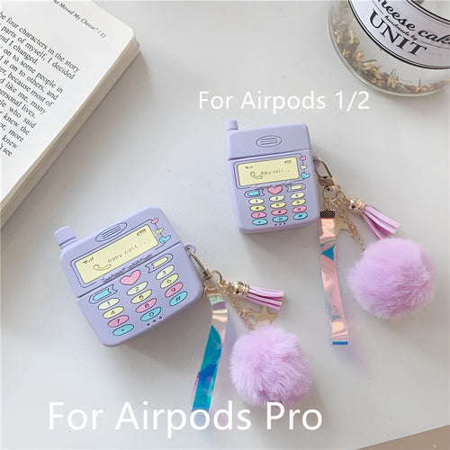 Purple silicone AirPods case with fur ball pendant, clamshell design for AirPods Pro and AirPods 1/2 models