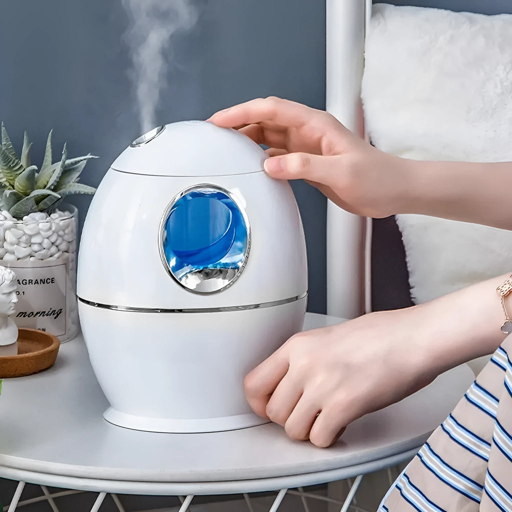 White rounded USB aromatherapy humidifier with water tank and mist output