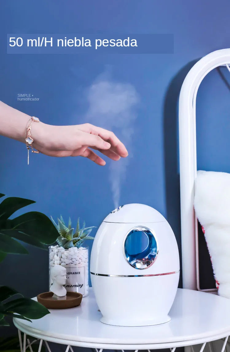 White rounded USB aromatherapy humidifier with water tank and mist output