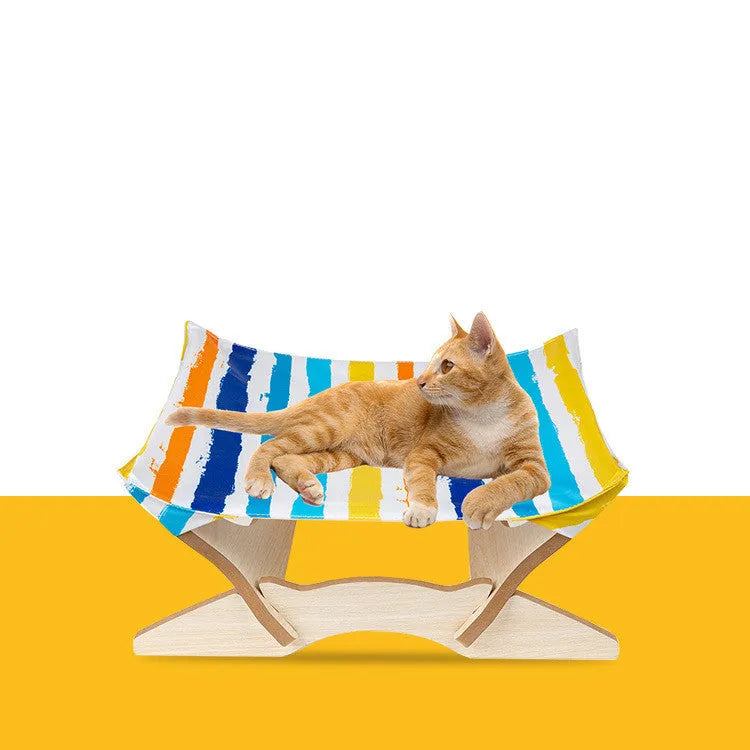 Wooden cat hammock with a striped passion stripe cloth cover on a wooden frame, sized for indoor cats