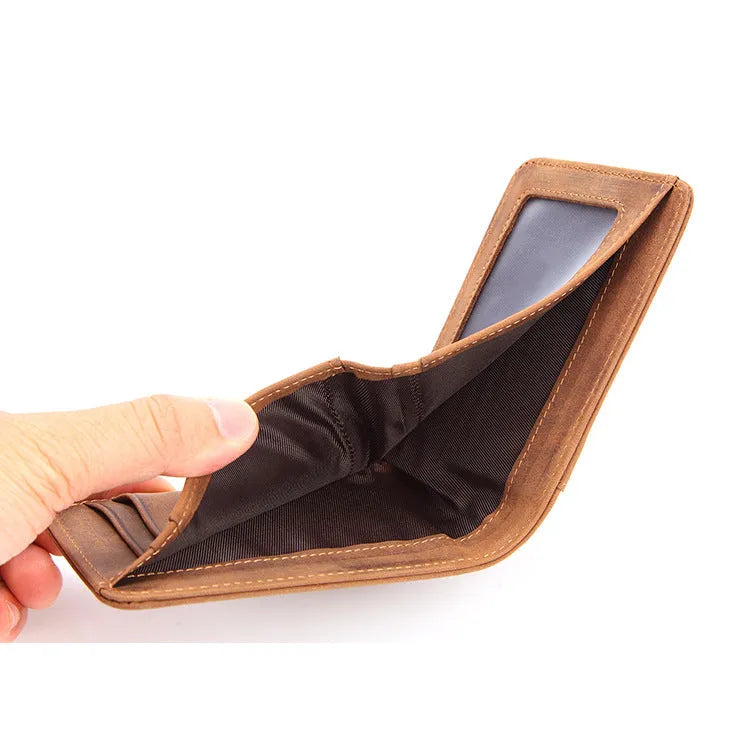Brown head layer cowhide men's RFID-blocking slim leather wallet showing card slots and money compartment.