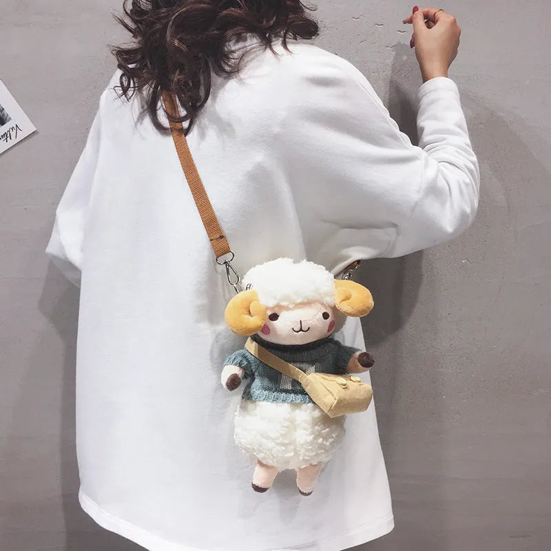 Little Sheep plush crossbody bag with lamb pattern in blue colour showing front zipper closure