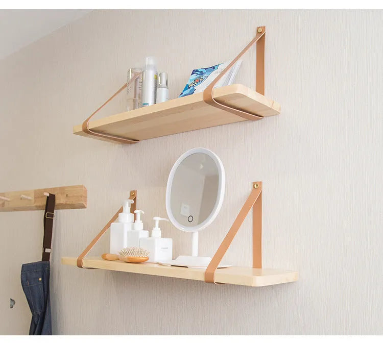 Nordic-style pine wood wall shelf for organising remotes, cards, and cosmetics
