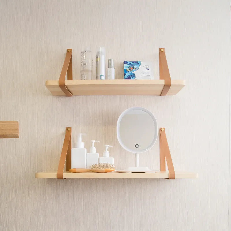Nordic-style pine wood wall shelf for organising remotes, cards, and cosmetics