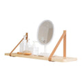 Nordic-style pine wood wall shelf for organising remotes, cards, and cosmetics