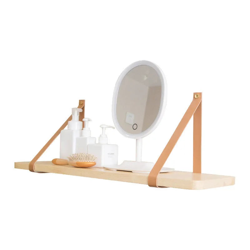 Nordic-style pine wood wall shelf for organising remotes, cards, and cosmetics