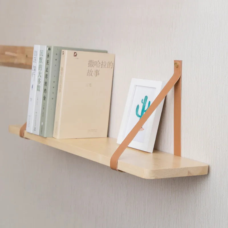 Nordic-style pine wood wall shelf for organising remotes, cards, and cosmetics