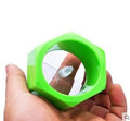 Yellow and green plastic spiral vegetable cutter for kitchen use.