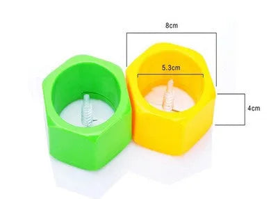 Yellow and green plastic spiral vegetable cutter for kitchen use.