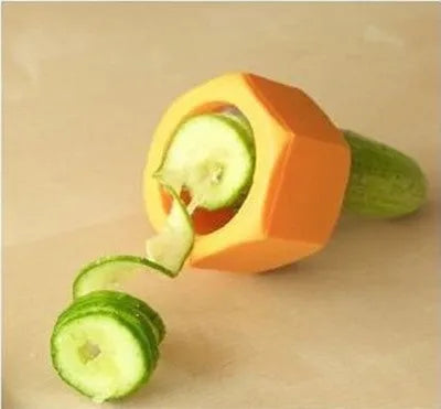 Yellow and green plastic spiral vegetable cutter for kitchen use.