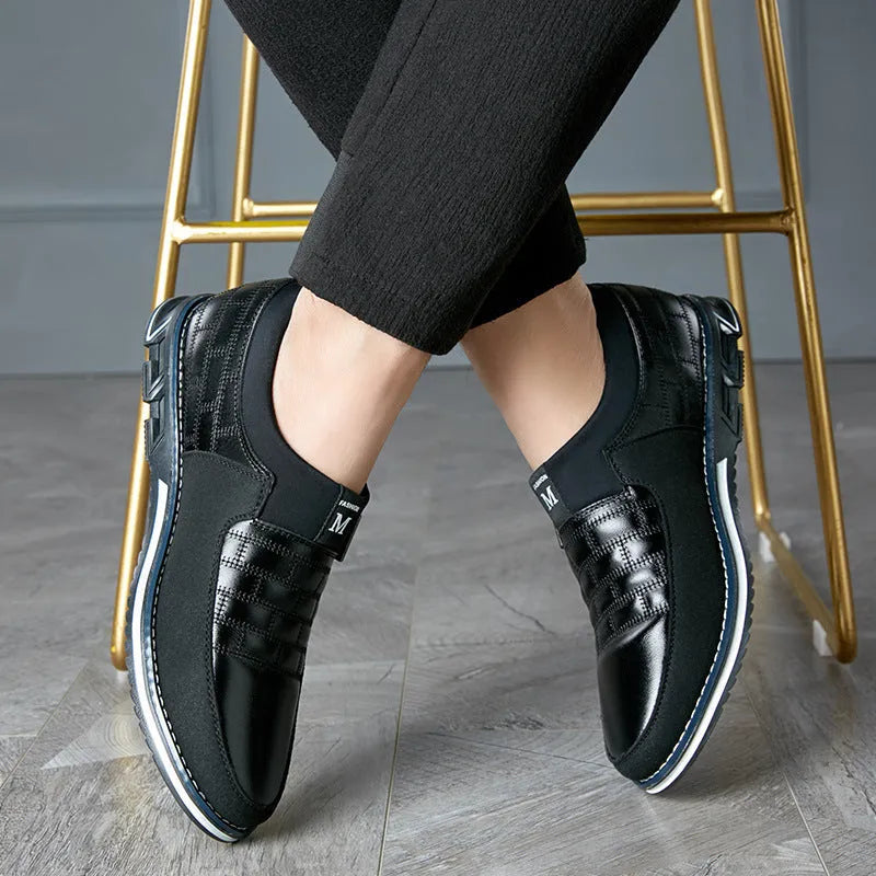 Men's casual leather shoes in blue, black, brown and white colours showing low-top design