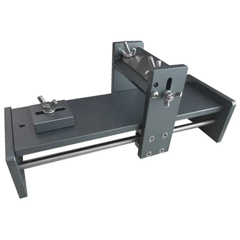 Aluminium fixed angle gantry sharpening tool for woodworking chisels, planers, and carving knives on a workbench.