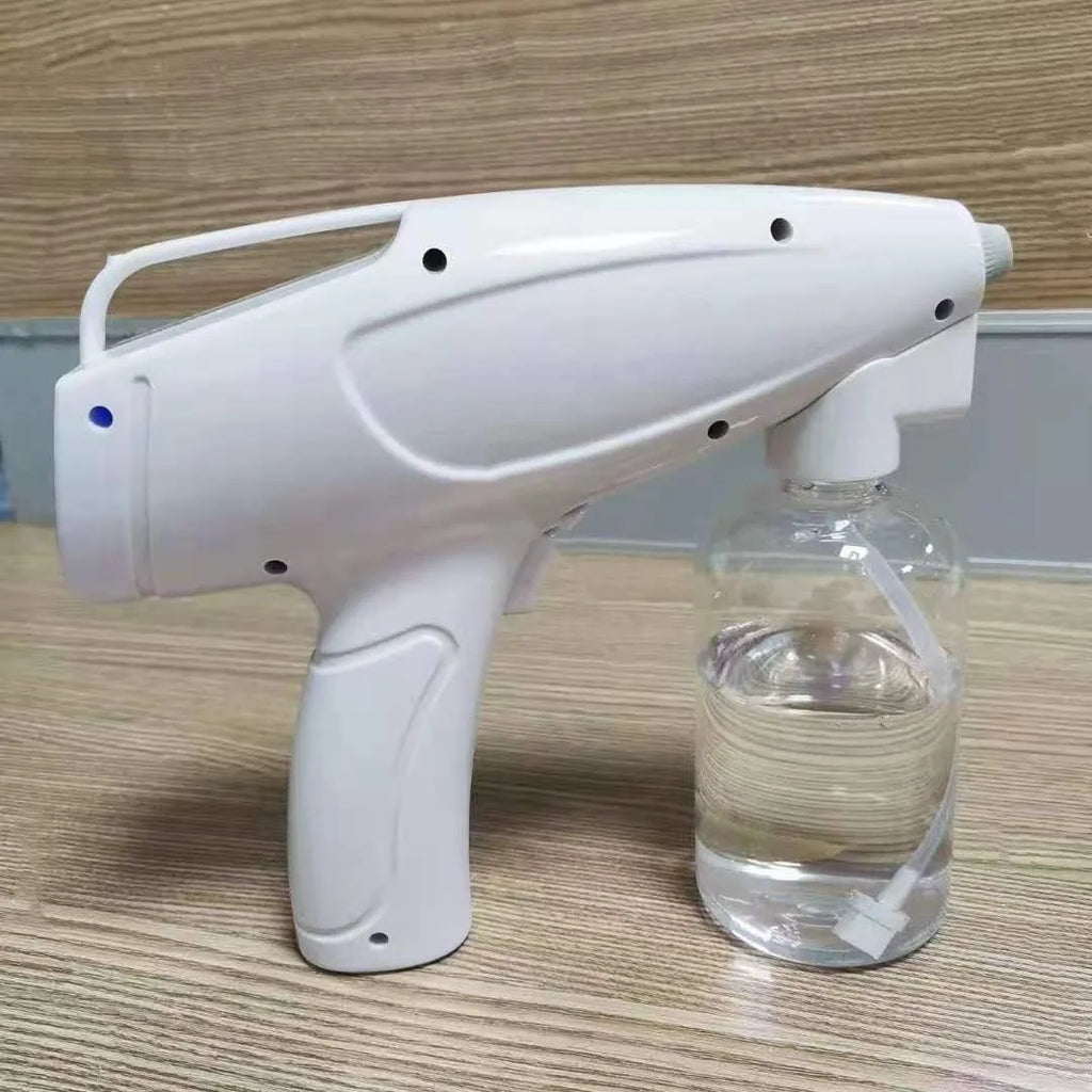 White handheld wireless electric spray disinfection gun with anti-blocking nozzle and USB-C charging port