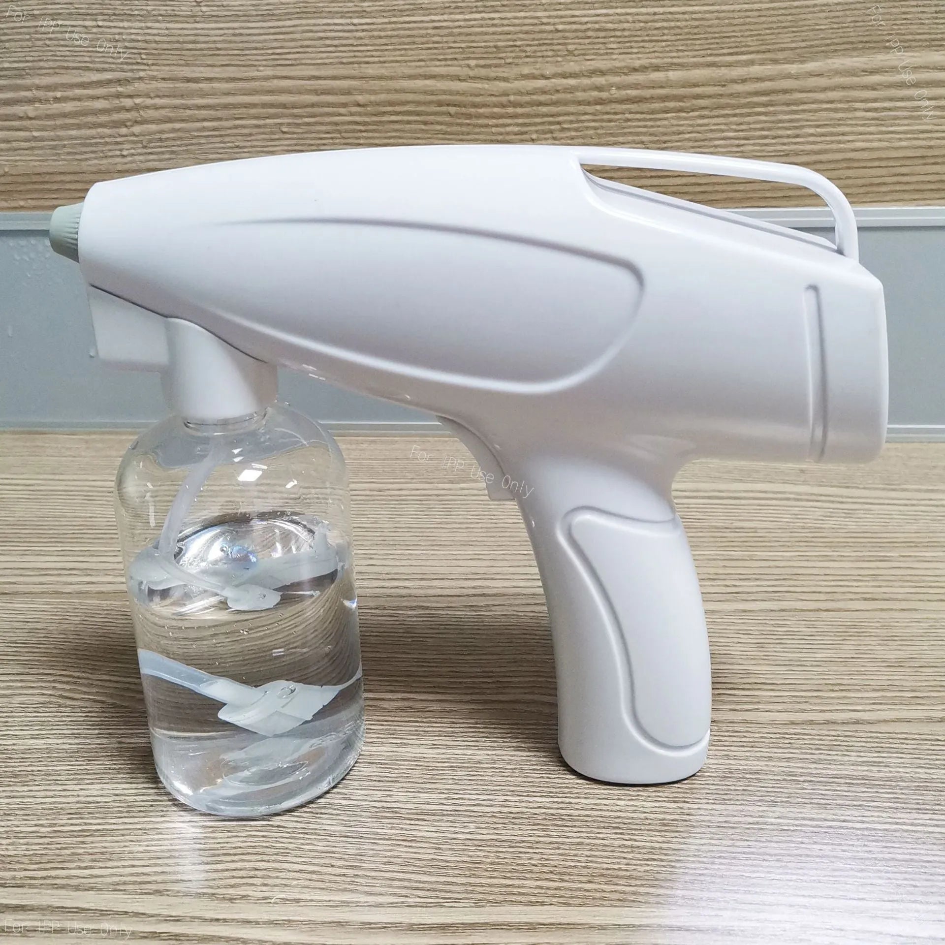 White handheld wireless electric spray disinfection gun with anti-blocking nozzle and USB-C charging port